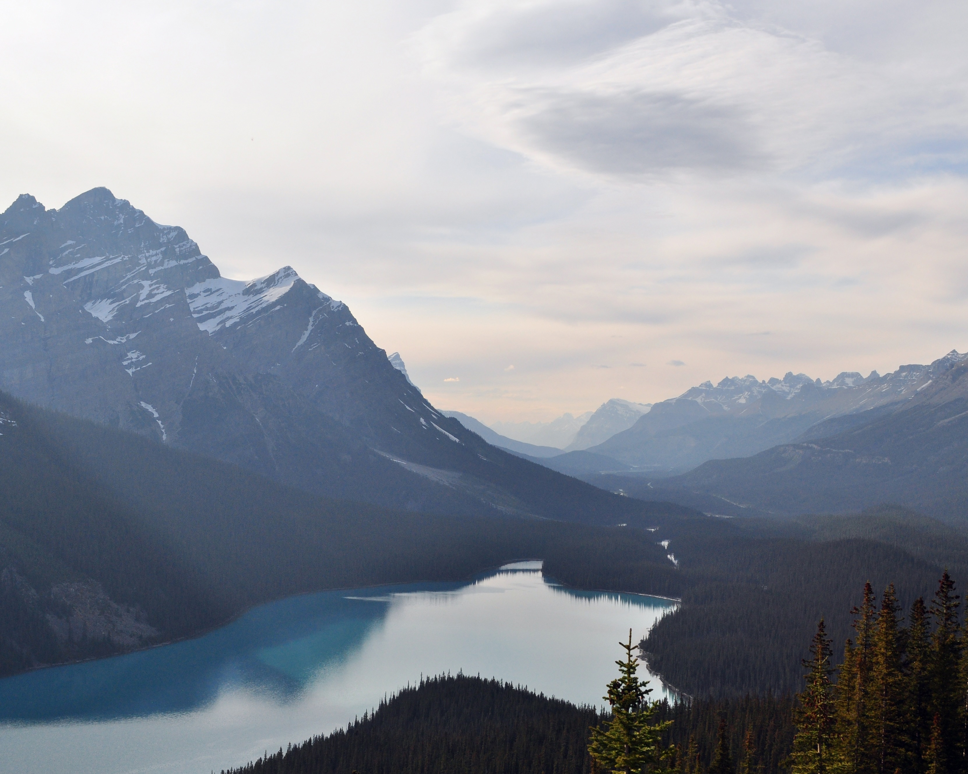 Luxury family vacations: a blue lake and mountains in Canada.