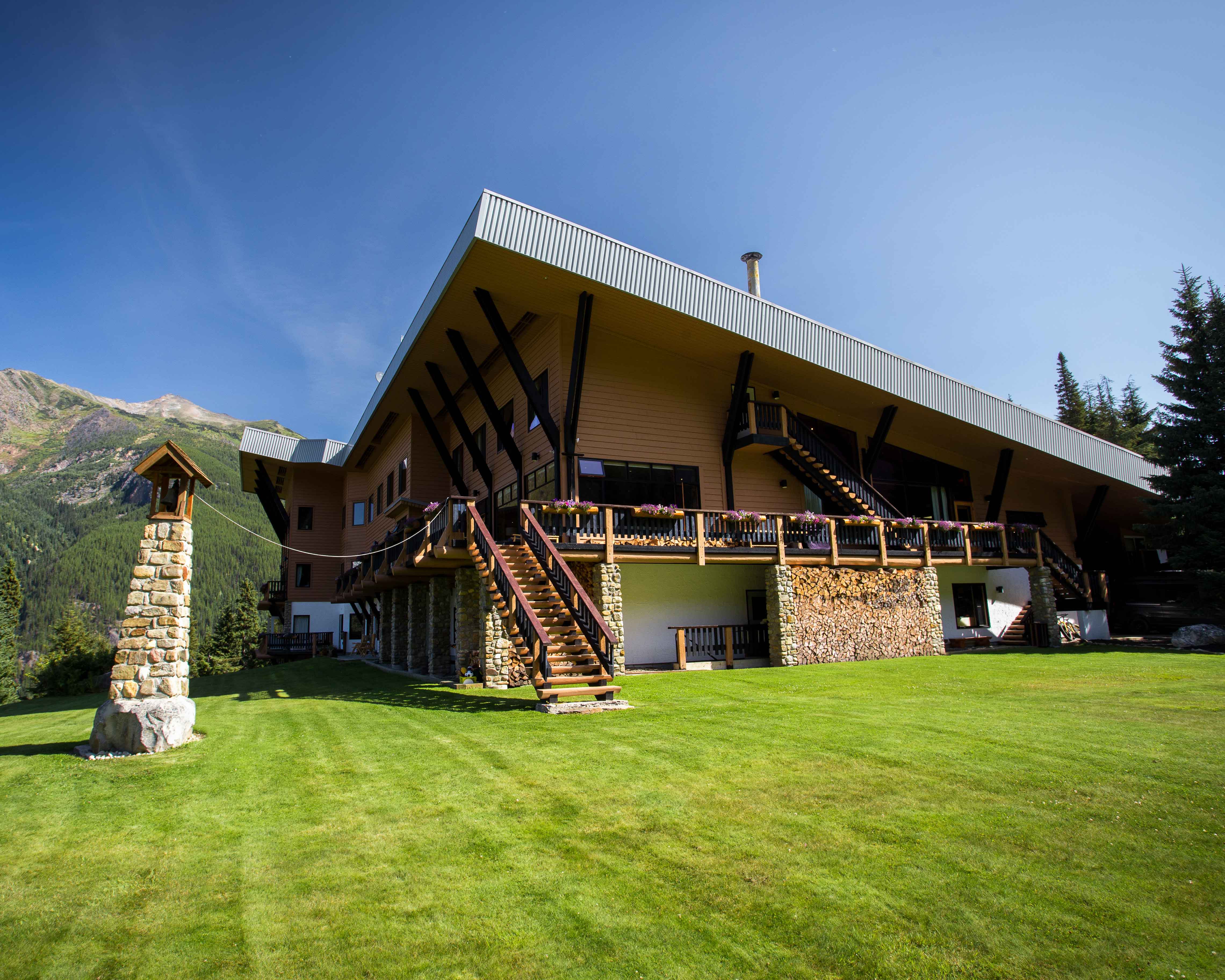 Finest lodges: a mountain chalet with blue skies.