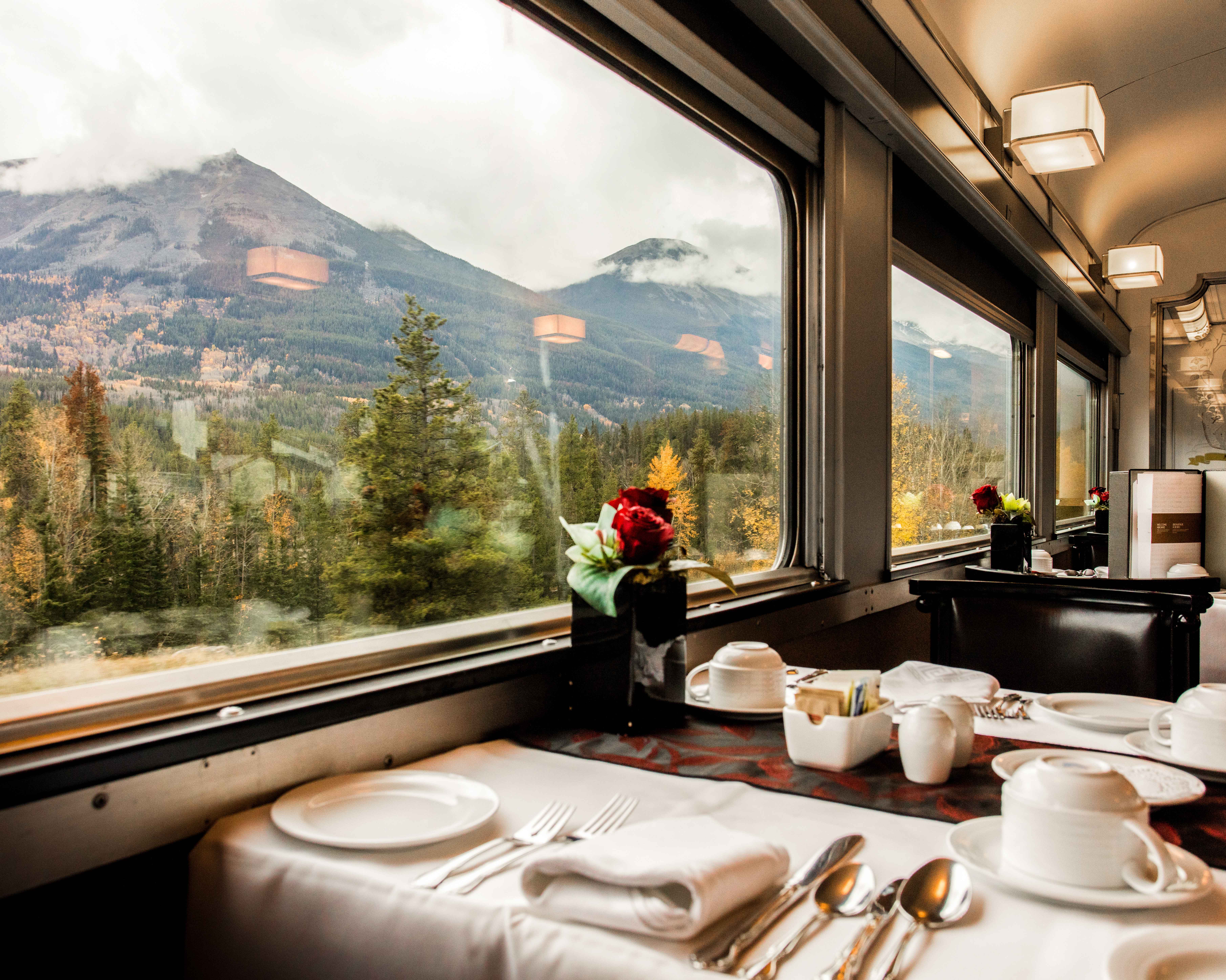 High-end train travel: dinner laid out for two.