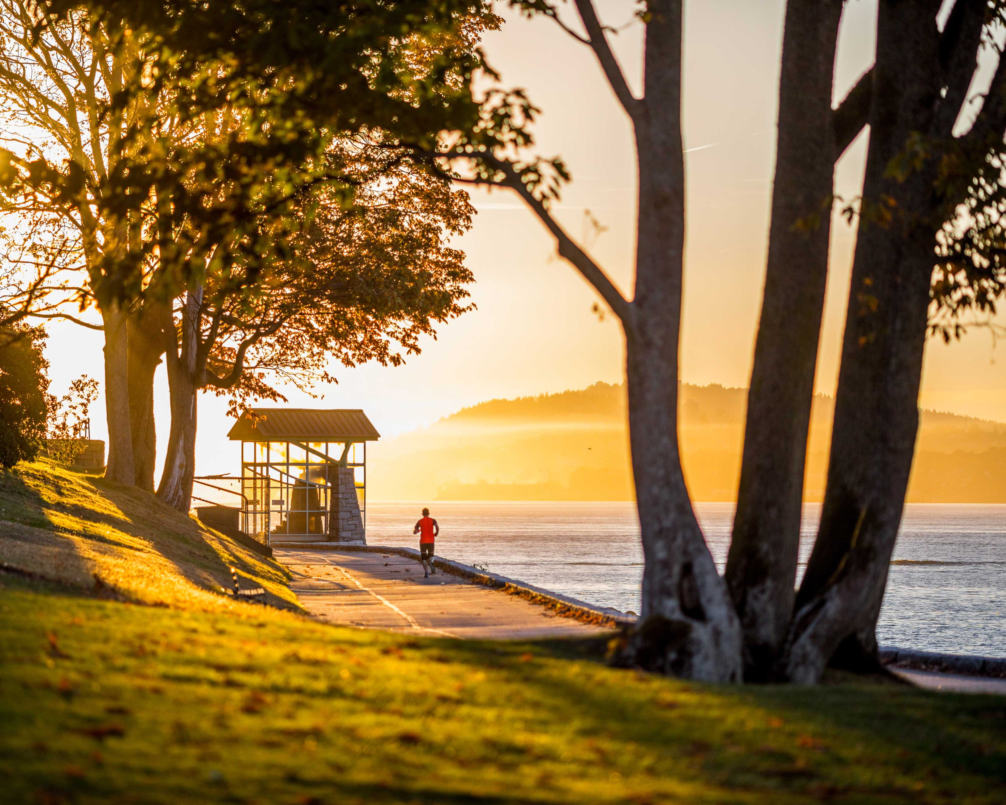 Vancouver vacations: Runner along seawall of Stanley Park.
